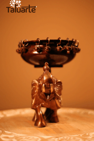 The copper coloured elephant with Urli